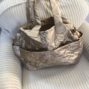 Chico’s large travel tote / puffer bag in gold